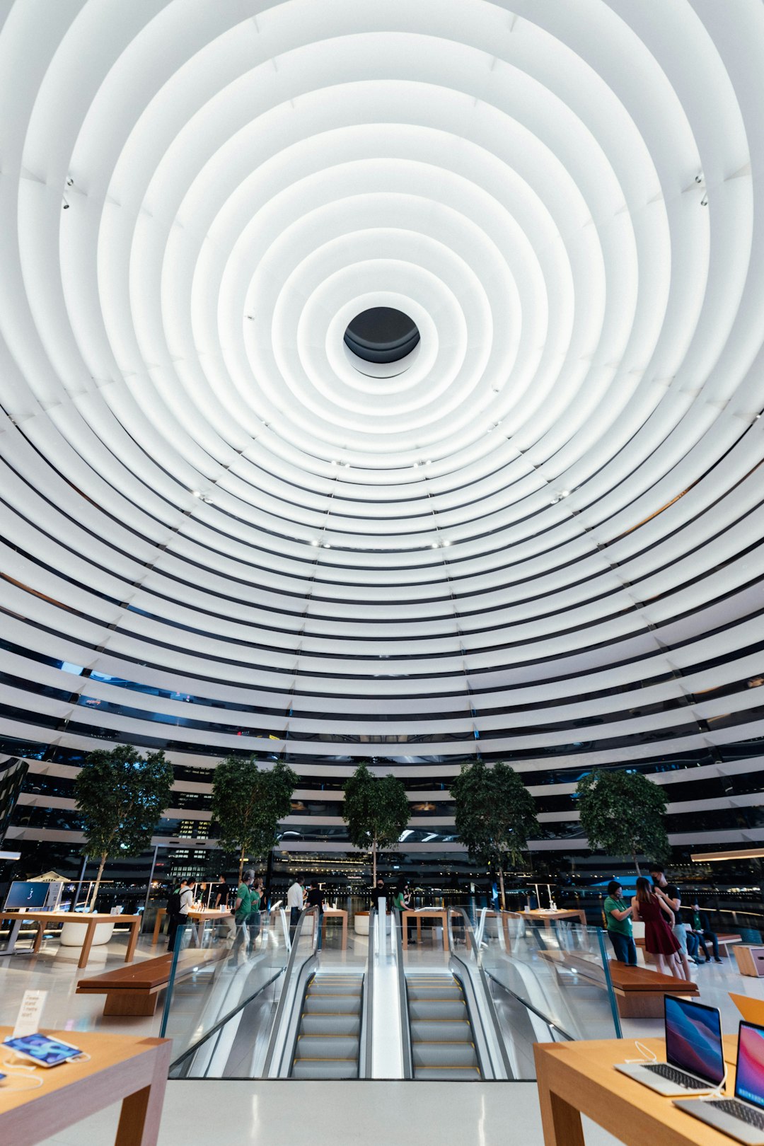 people walking on white round tunnel during daytime