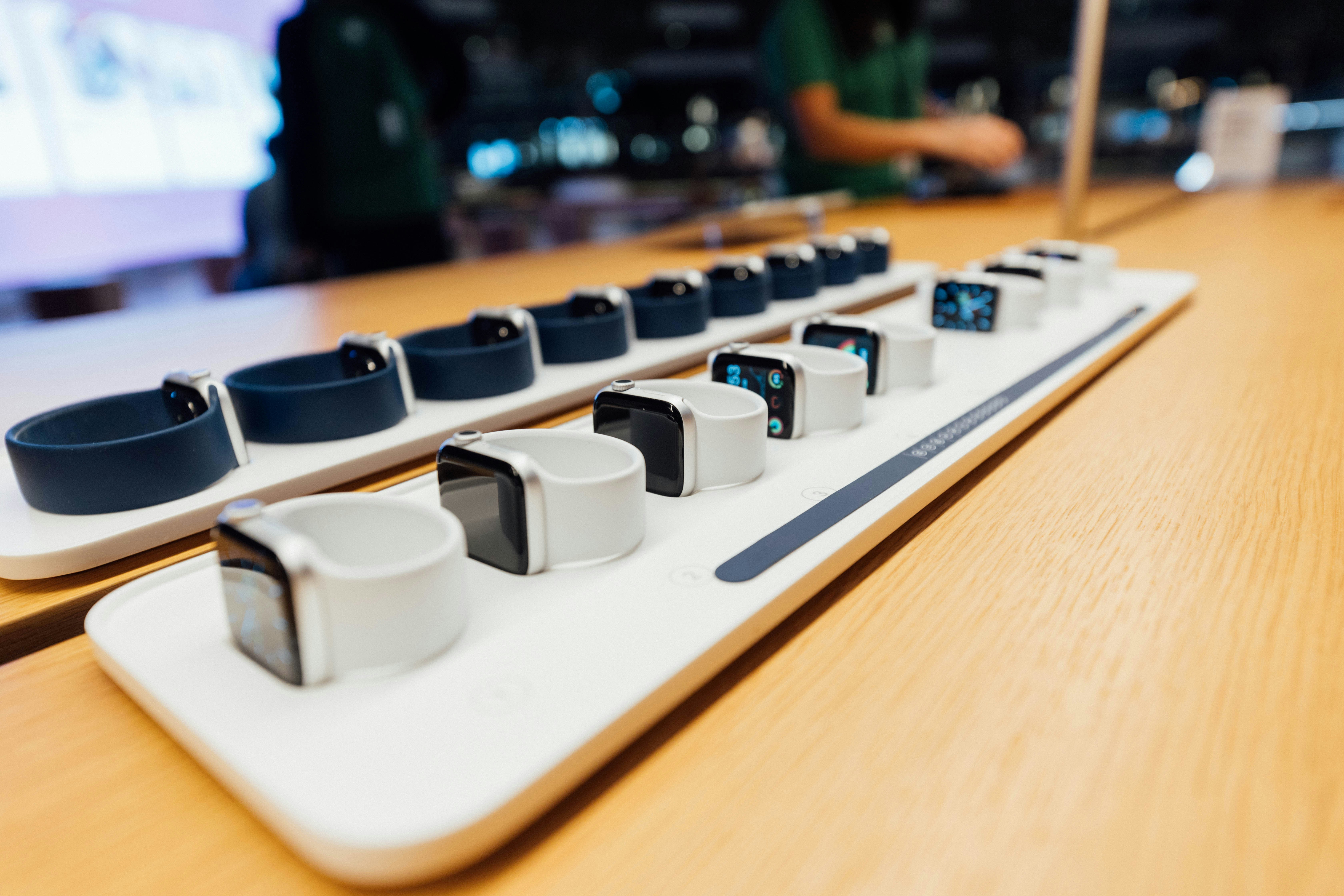 white and black chess piece on brown wooden table