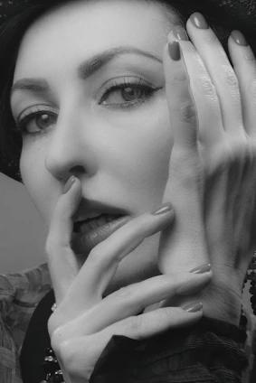 Portrait of a charismatic character with expressive eyes and colorful attire.