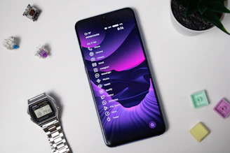 A sleek black and purple themed website homepage on a smartphone screen.
