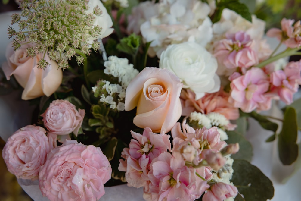 pink roses and white babys breath flowers