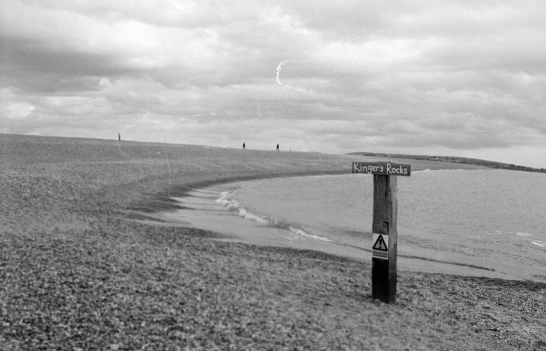 grayscale photo of road sign