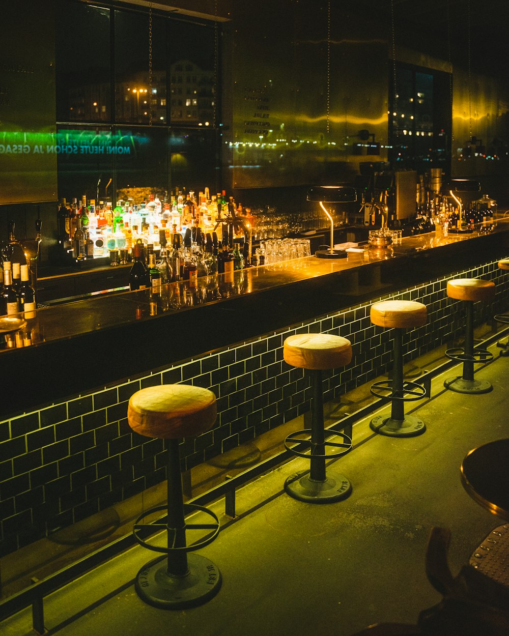 white pendant lamps turned on during nighttime