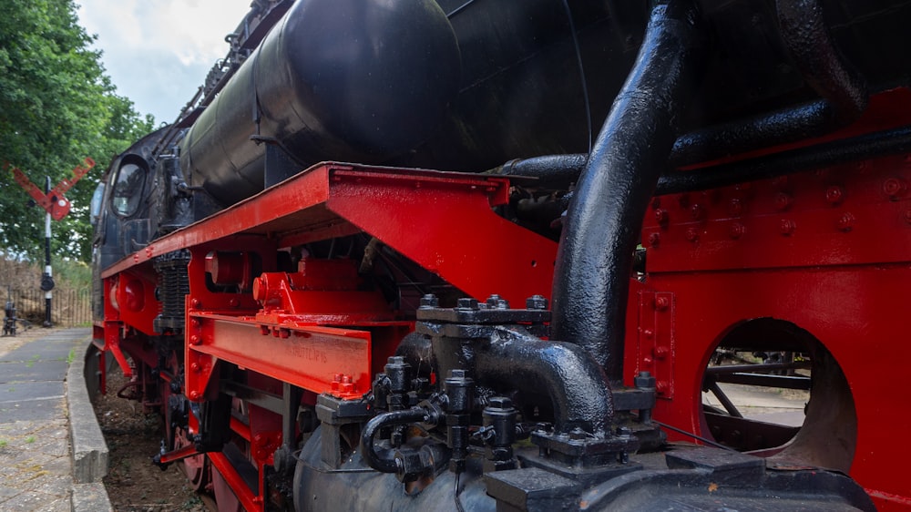 black and red train engine