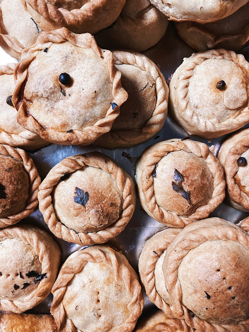 brown round pastry on brown wooden table