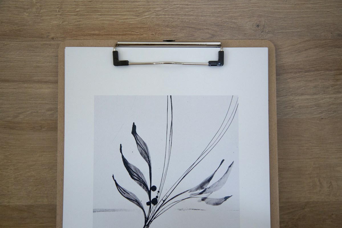 Black and white sketch of a flower, illustrating creative community event ideas in a blog about neighborhood gatherings.