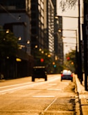 A photographer capturing vibrant street scenes during golden hour.