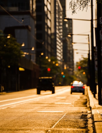 A photographer capturing vibrant street scenes during golden hour.