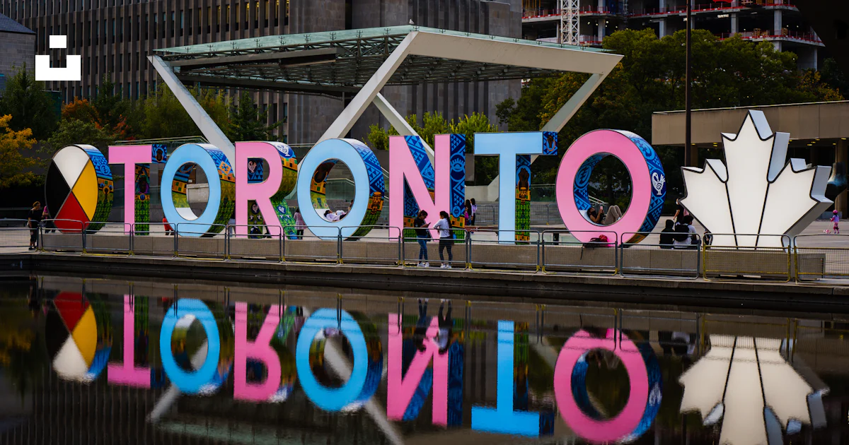 Toronto Reference Image The toronto sign is reflected in the water photo – Free City hall Image ...