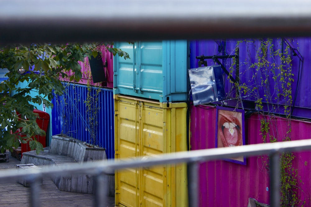 blue yellow and red plastic crates