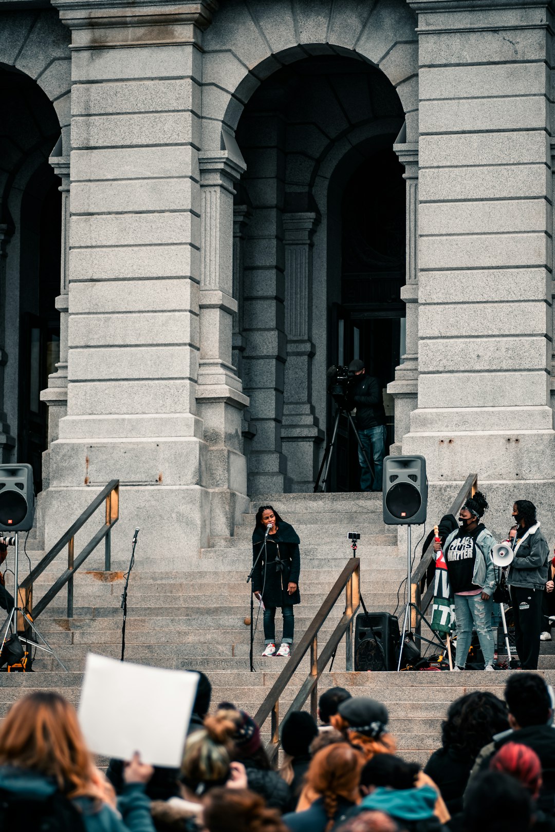 people walking on sidewalk during daytime