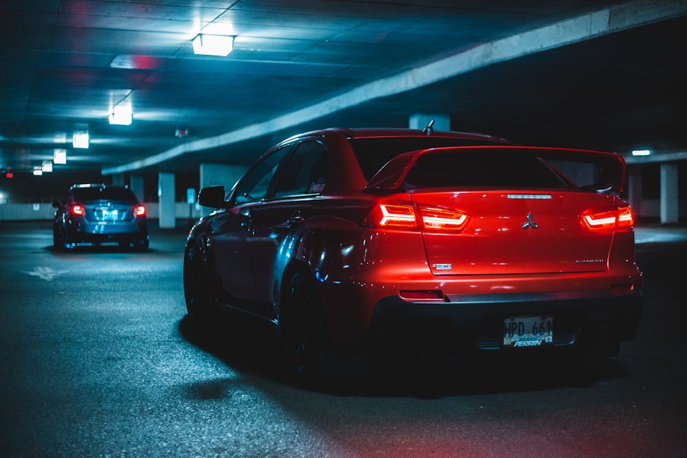 red car on parking lot