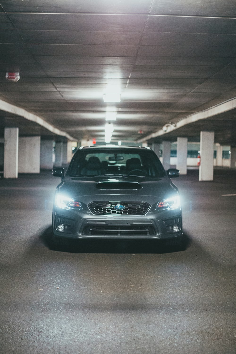 gray bmw car parked on parking lot