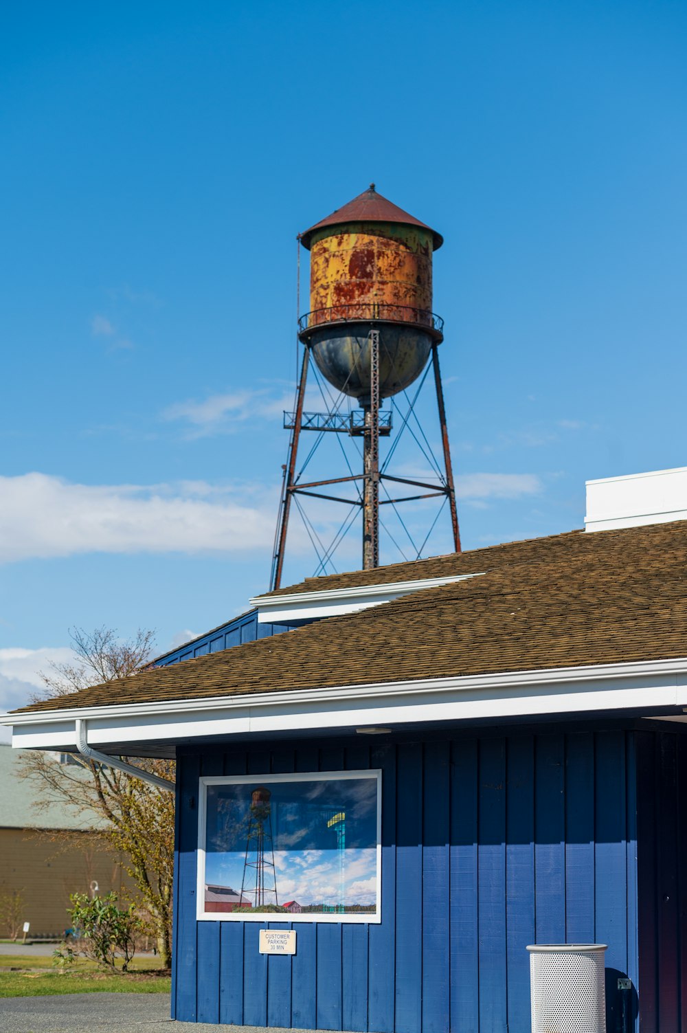 brown and white concrete building under blue sky during daytime