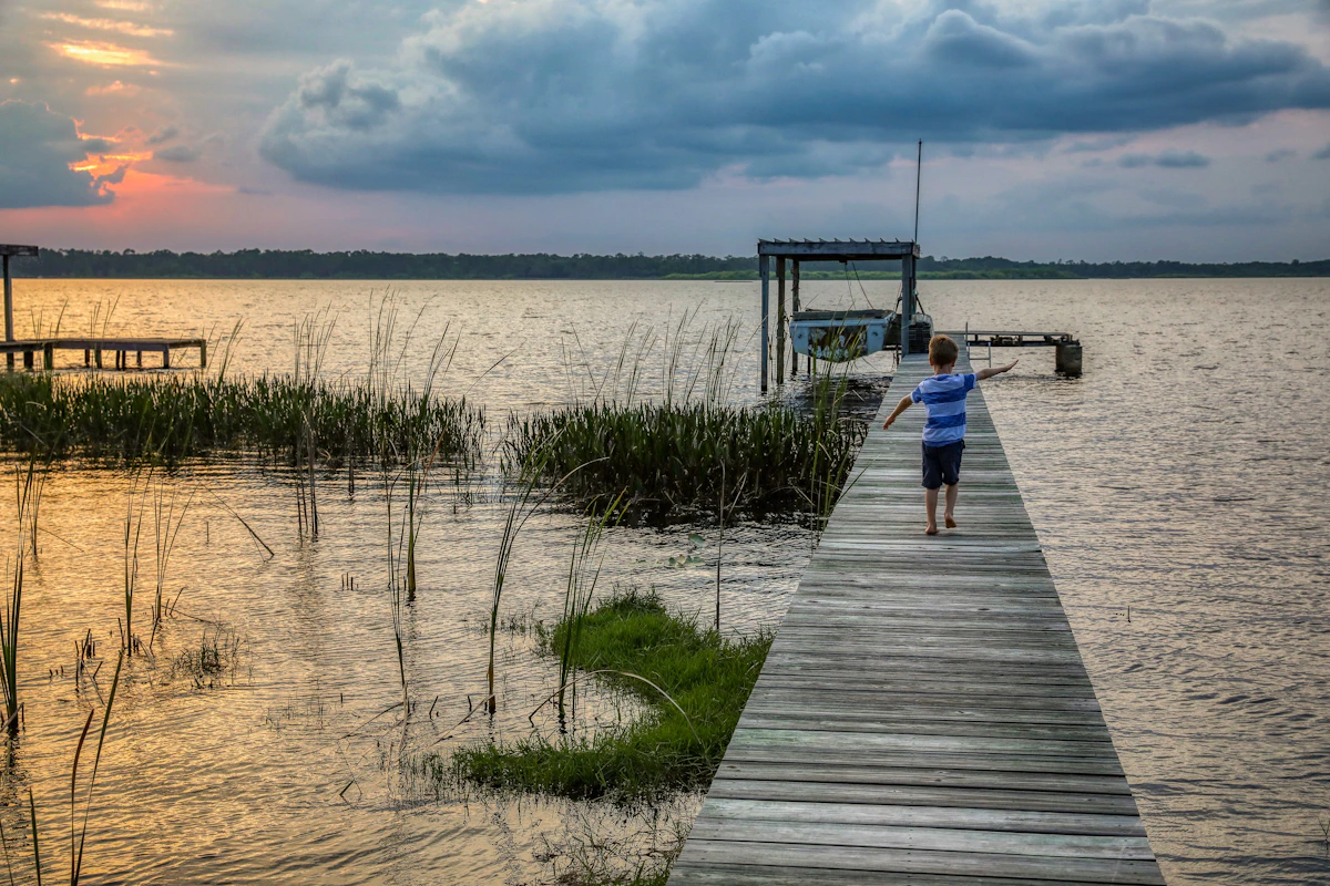 Wooden dock on a Central Florida lake at sunset