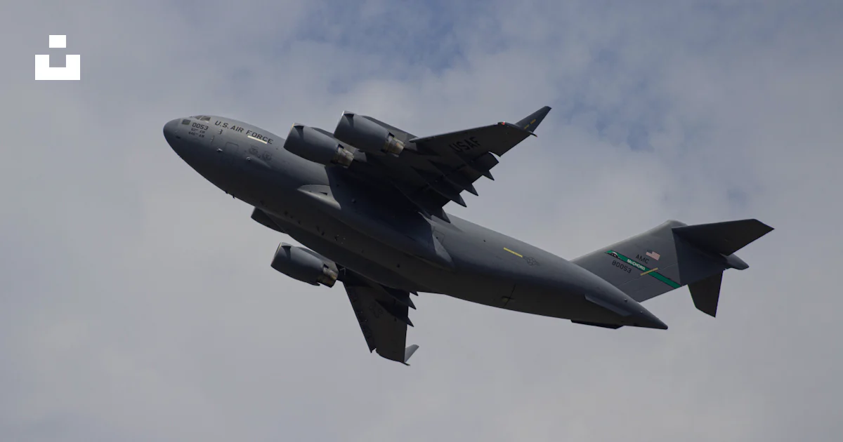 Iconic Grey Jet Gray jet plane under white clouds during daytime photo – Free Giant jet ...