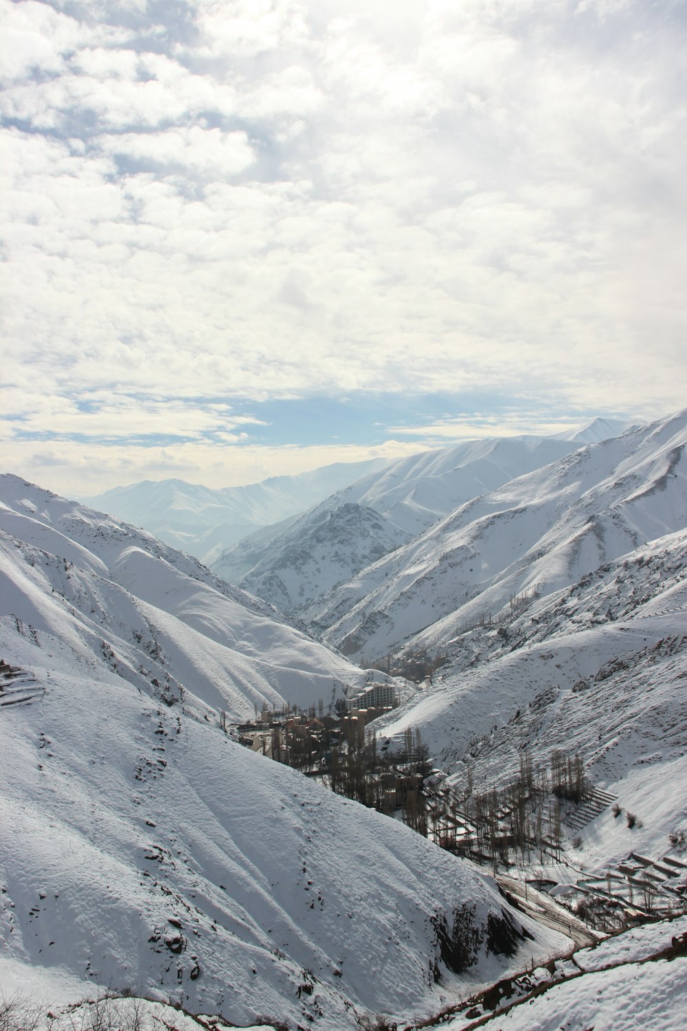 snow covered mountain during daytime