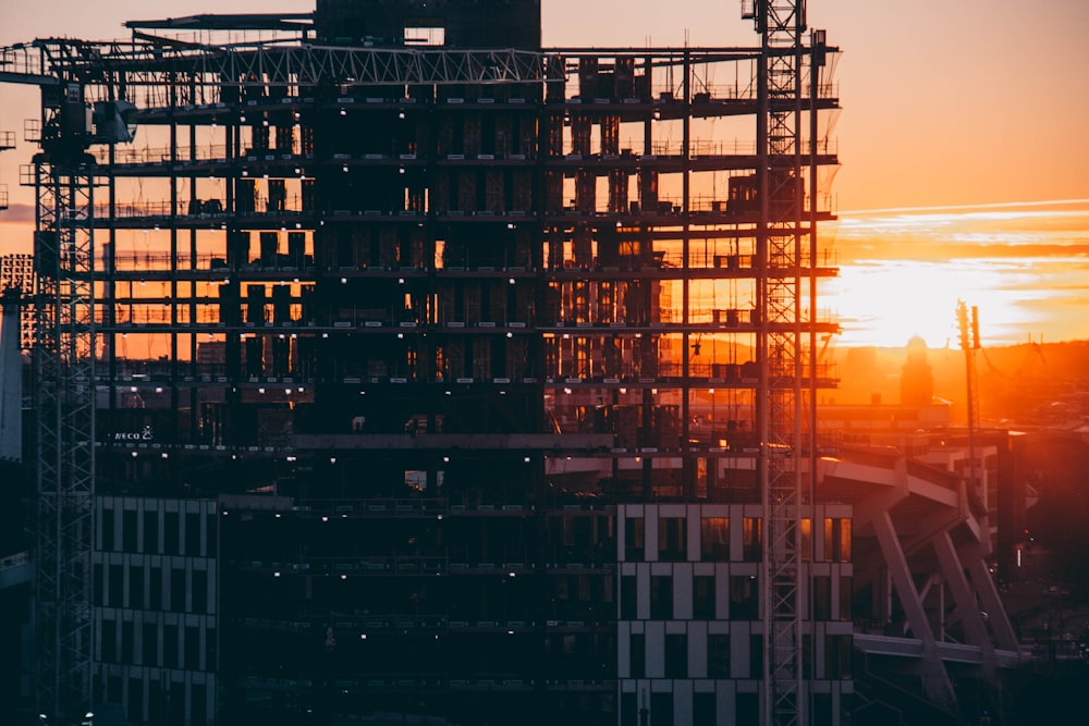 silhouette of building during sunset