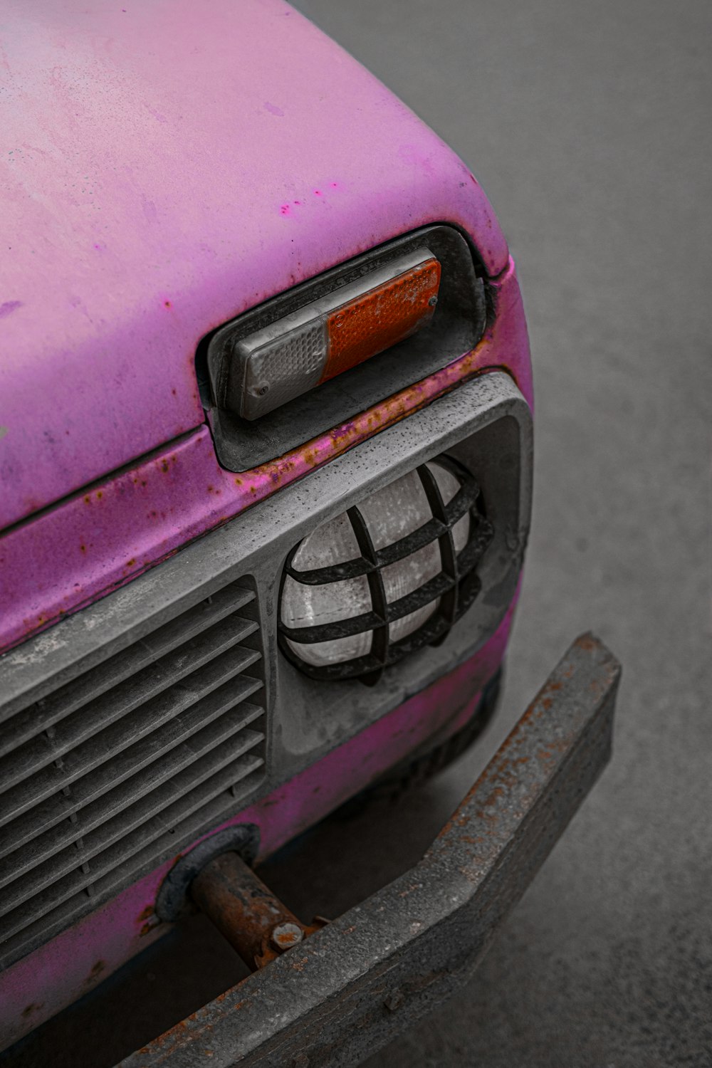 pink and black car in close up photography