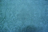 Elegant event styling featuring subtle leaf patterns and smooth rounded details.