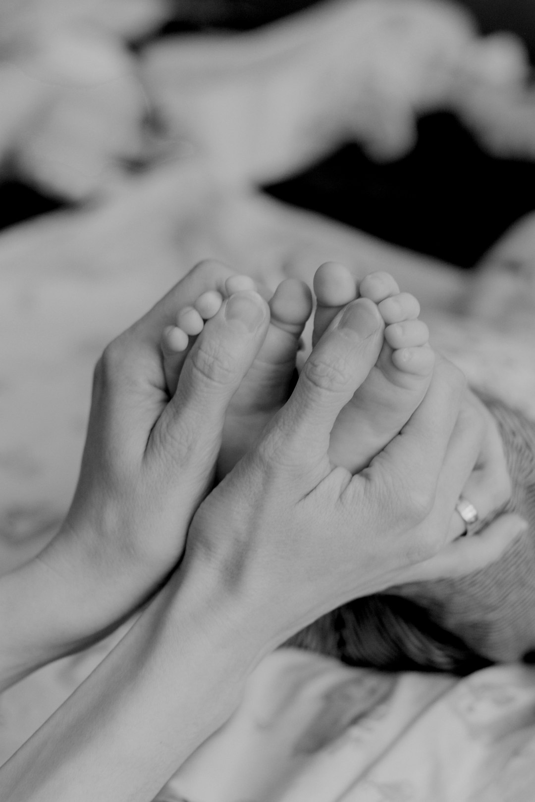 grayscale photo of persons feet