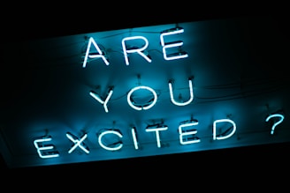 blue and white love neon light signage