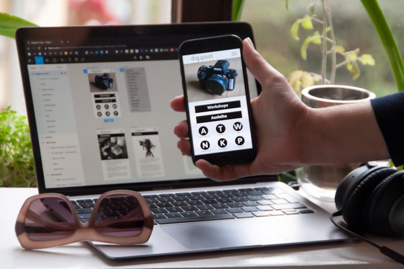 Developer working on AR application on smartphone with digital overlay visualization