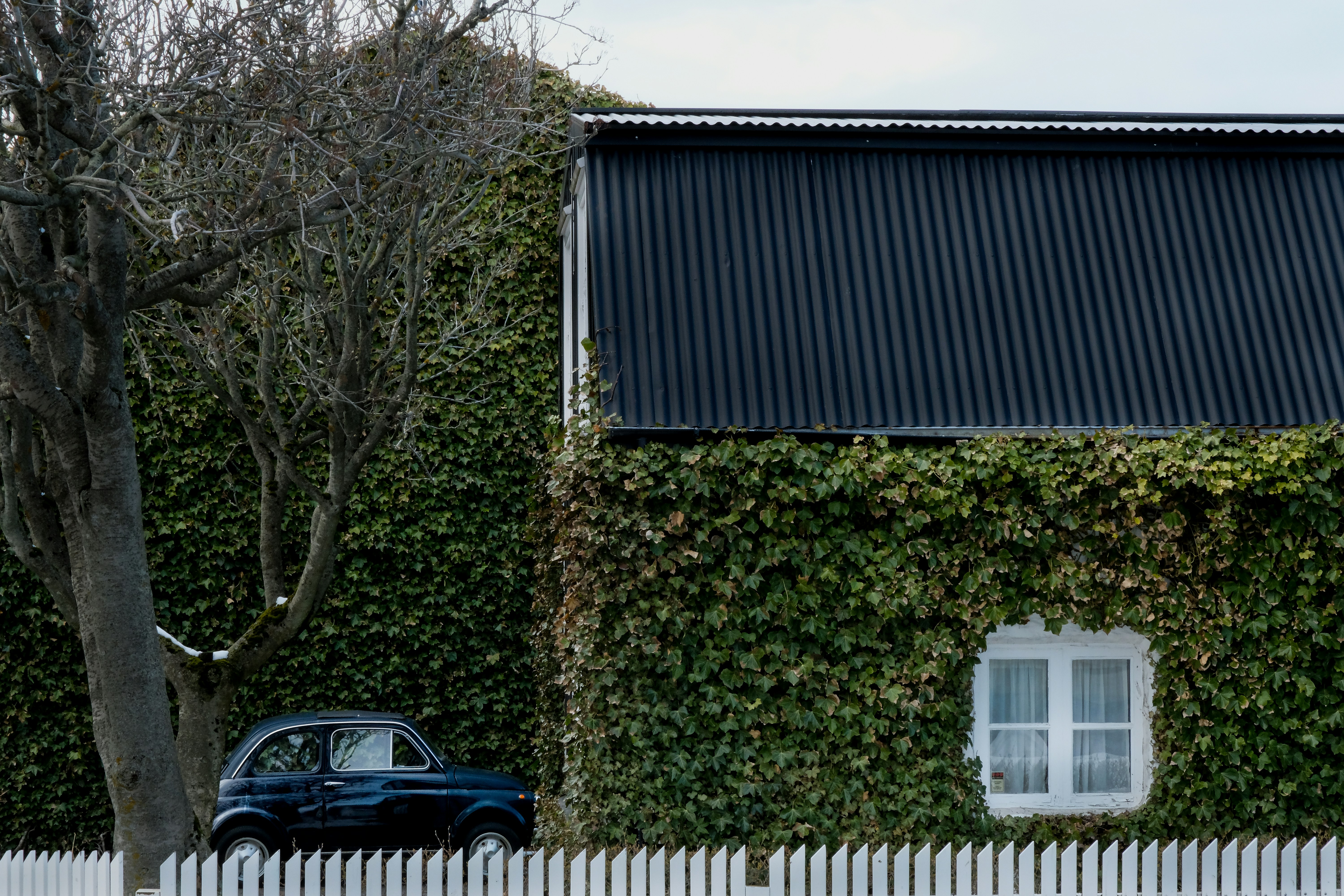 Corrugated metal roofing panels on a house