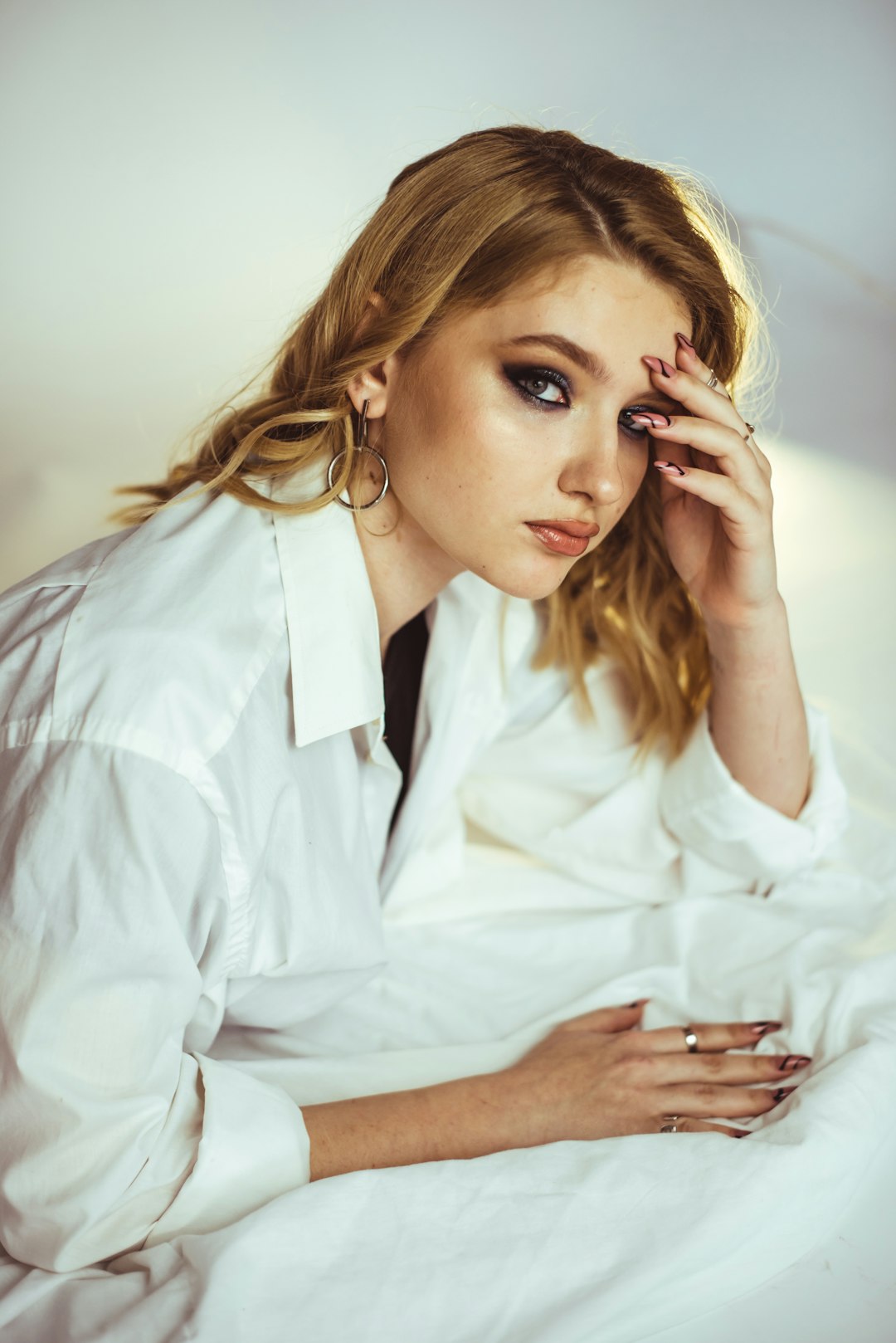 woman in white button up shirt