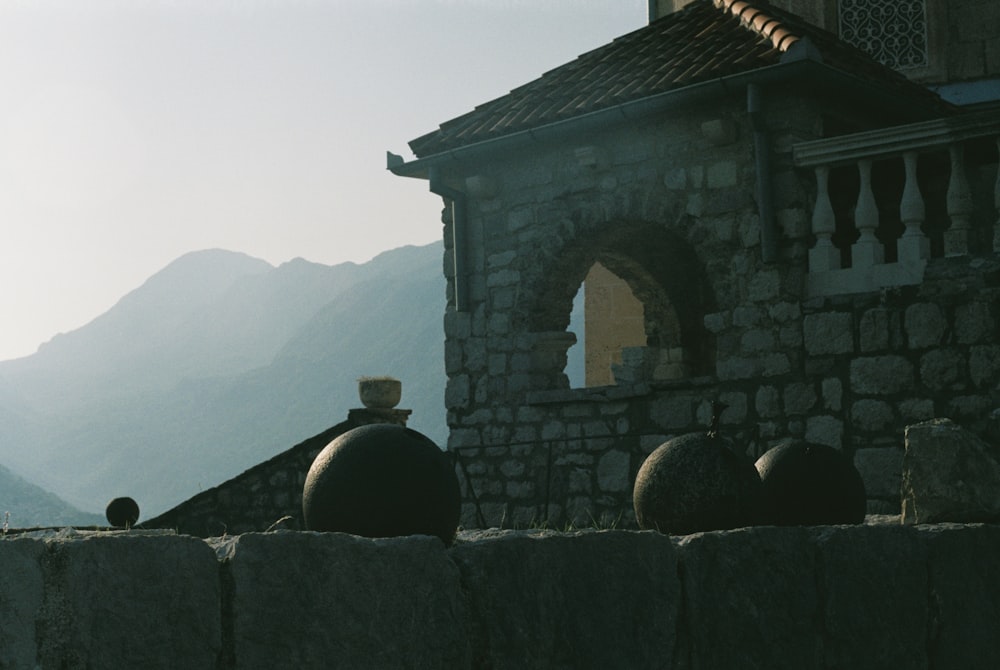 gray concrete building near mountain during daytime