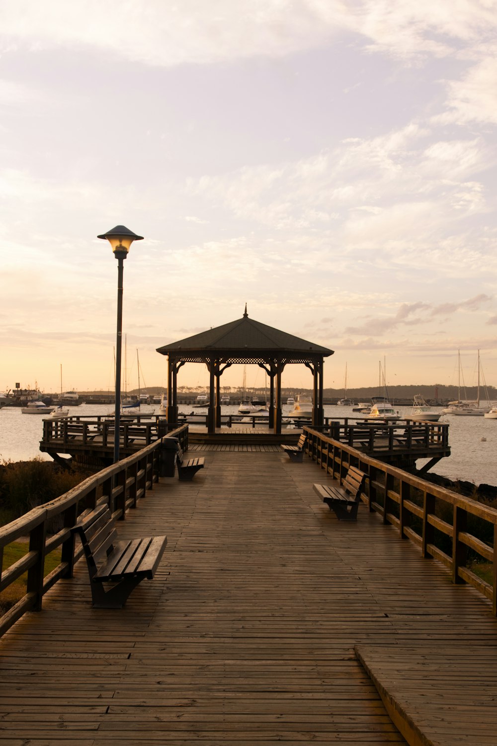 brown wooden dock on sea during daytime