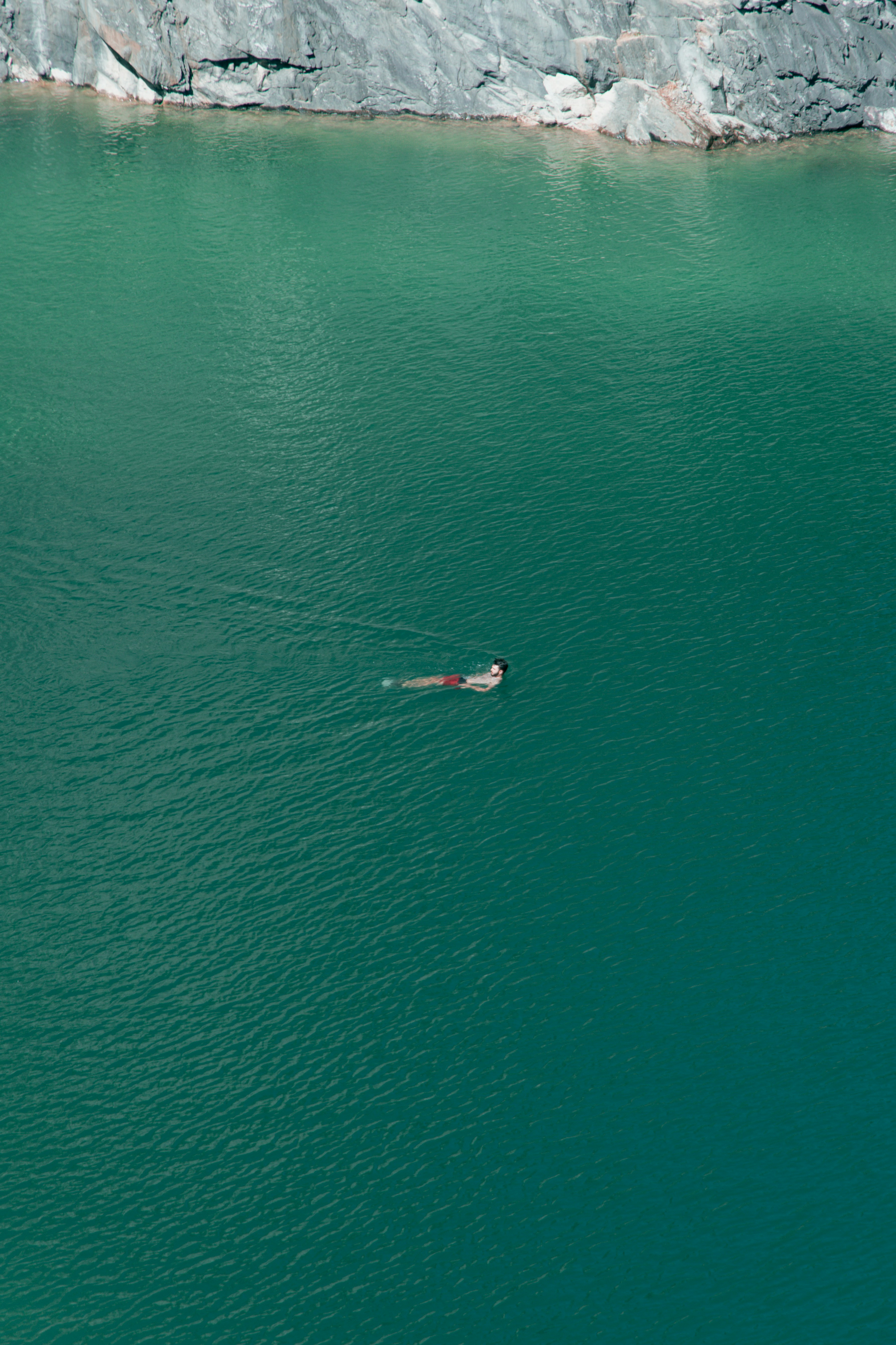 aerial view of boat on sea during daytime