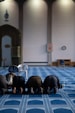 people sitting on white chairs