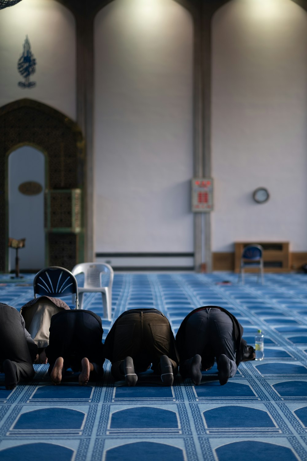 people sitting on white chairs