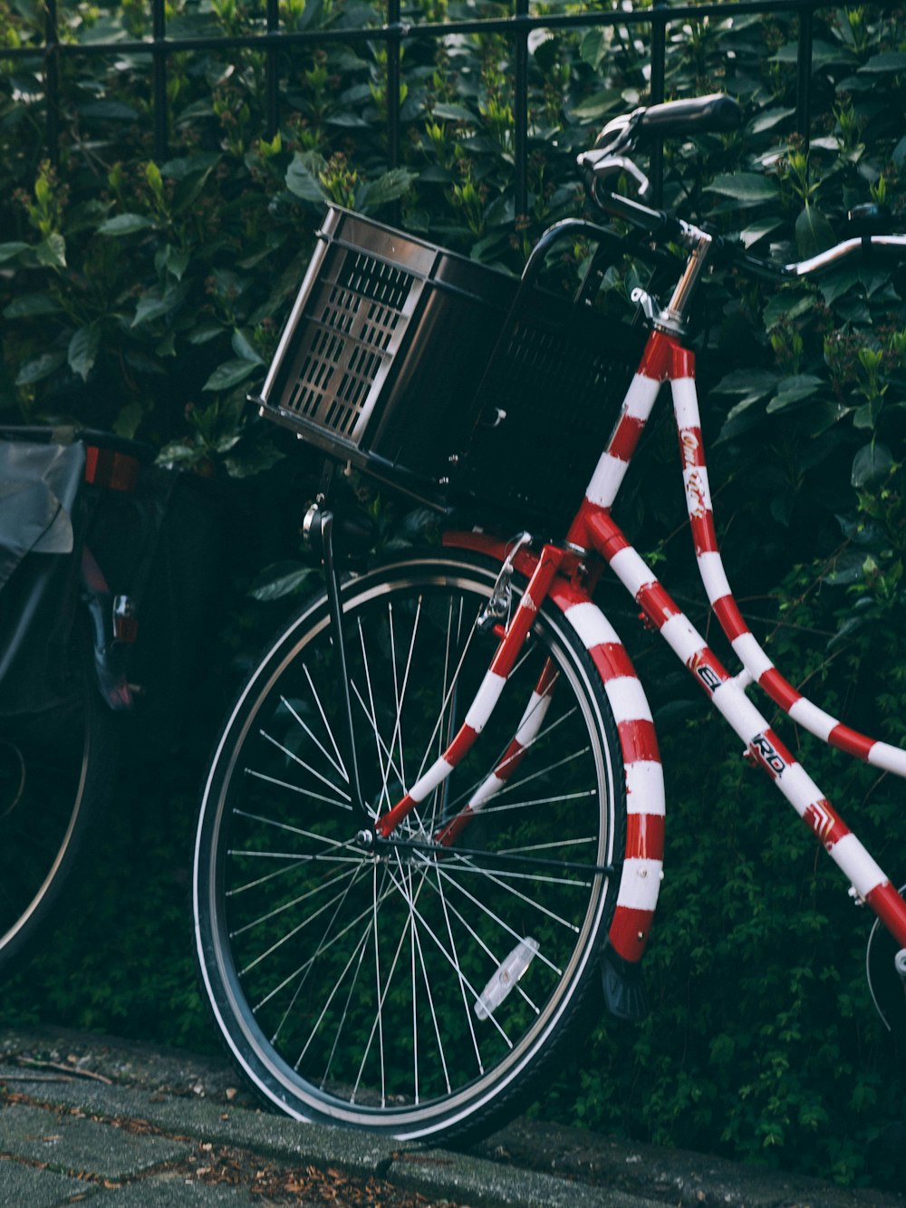 red and white bicycle with box