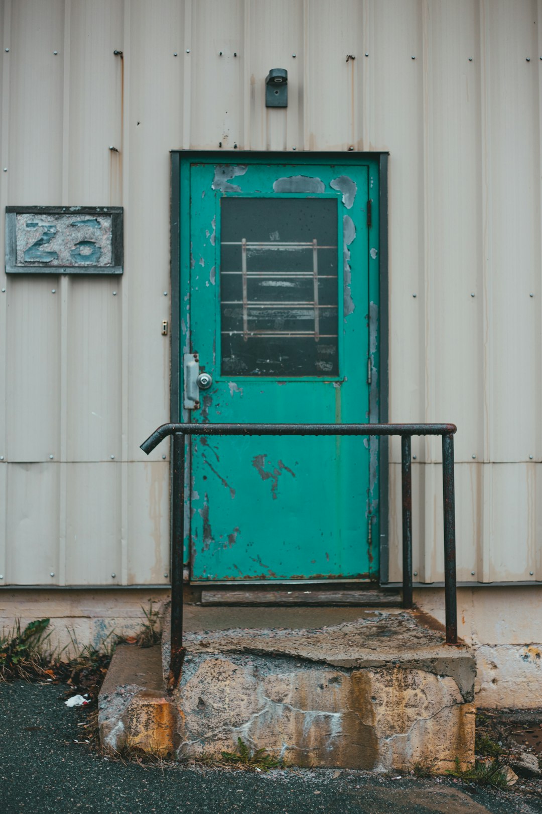 blue wooden door with white wooden frame