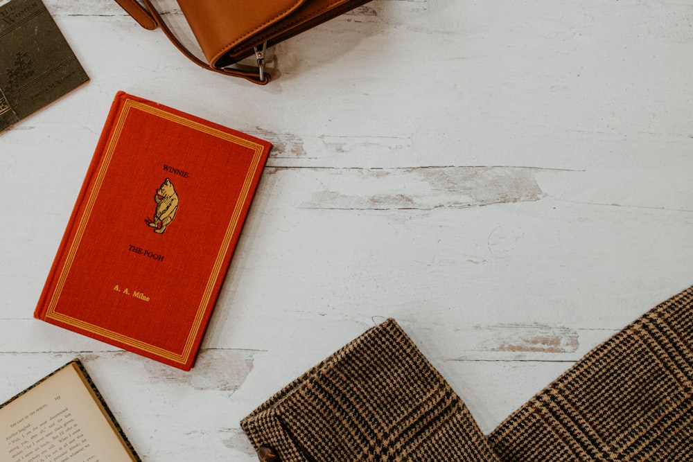 red book on white table