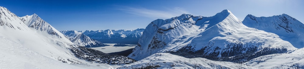 snow covered mountain under blue sky during daytime