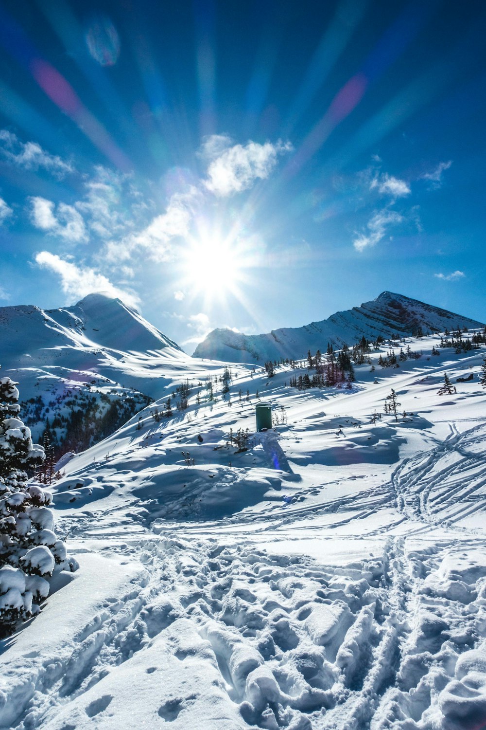 snow covered mountain under blue sky during daytime