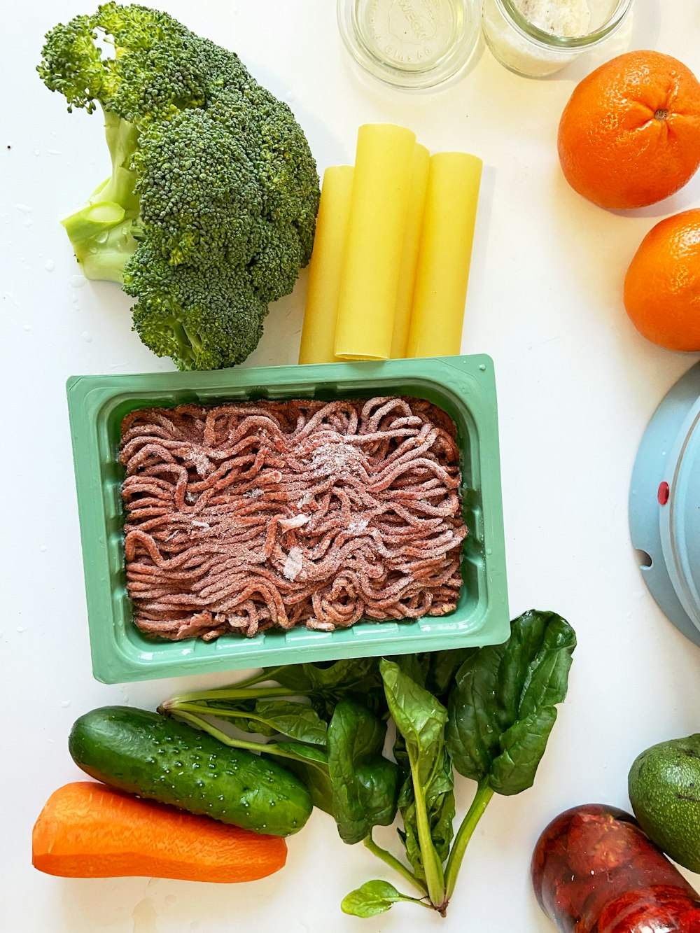 green vegetable on green plastic container