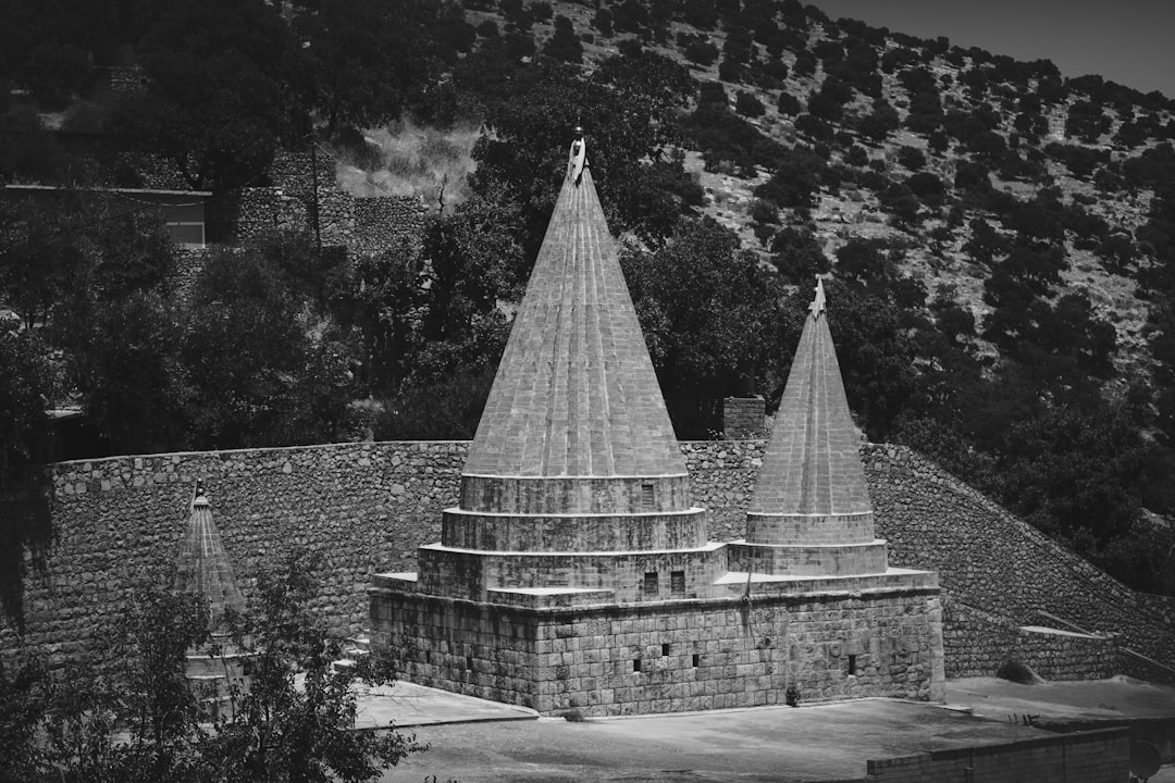 grayscale photo of concrete building