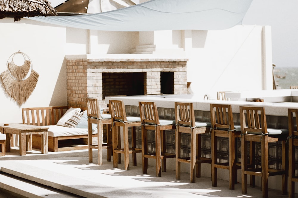 brown wooden chairs and table