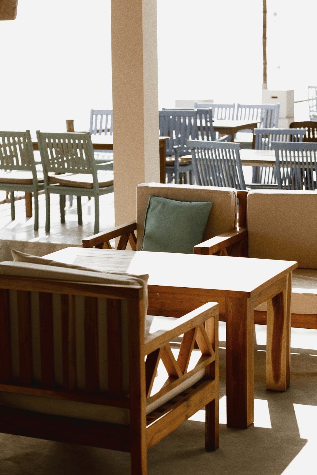 brown wooden table with chairs