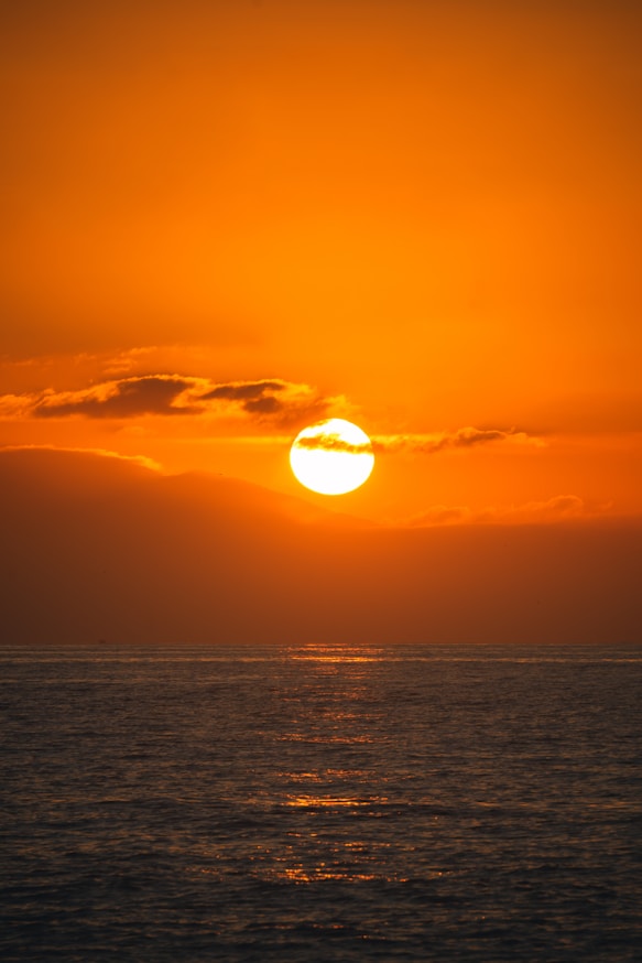 sun setting over the horizon