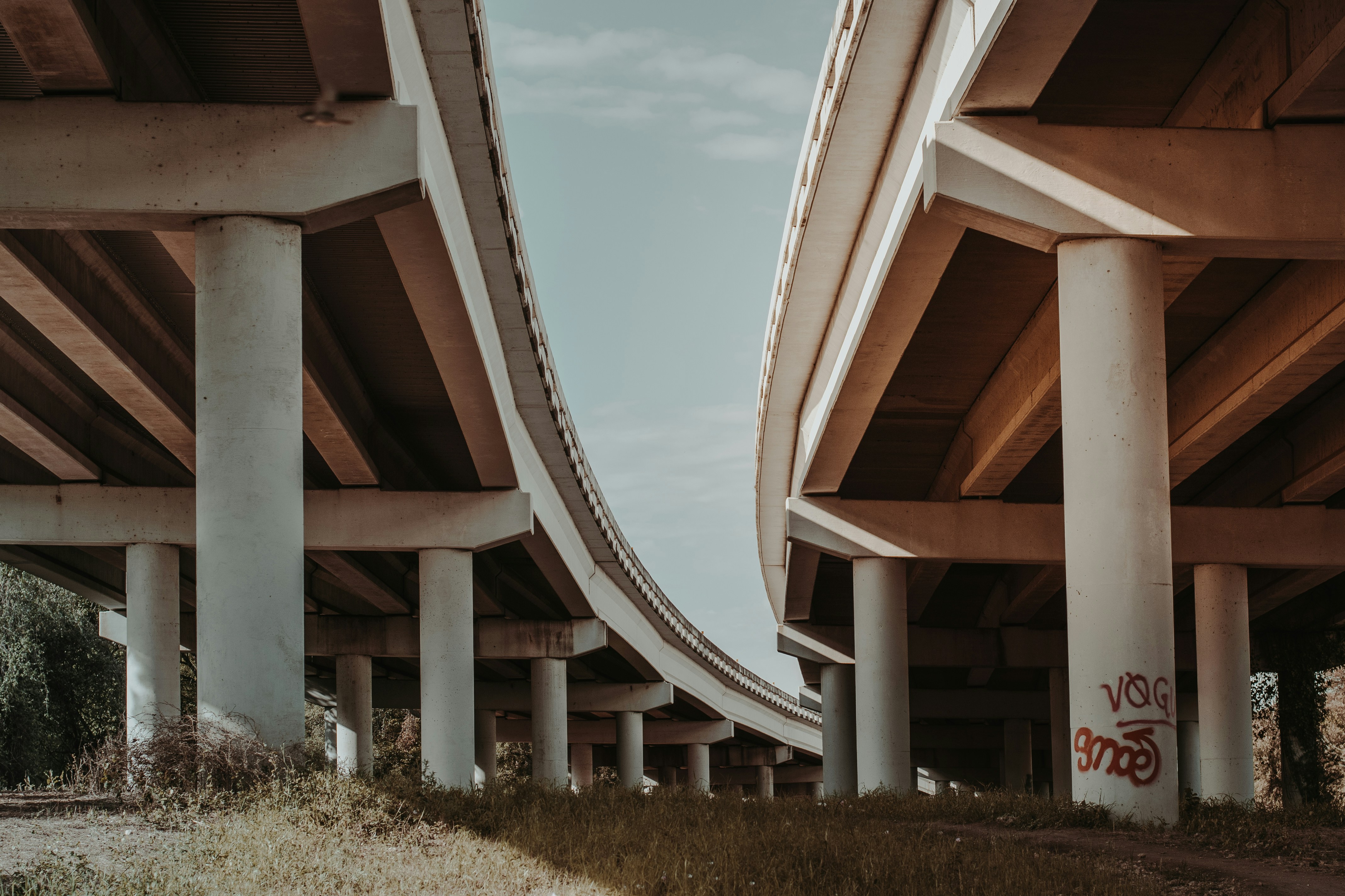 brown wooden building under white clouds during daytime