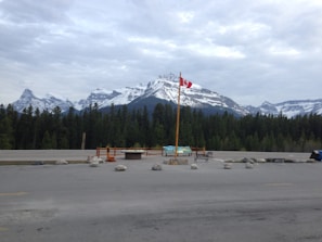 A scenic view of a Canadian landscape showcasing mountains and lakes.