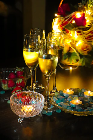 A decadent midnight feast spread adorned with exotic fruits, champagne, and candlelight