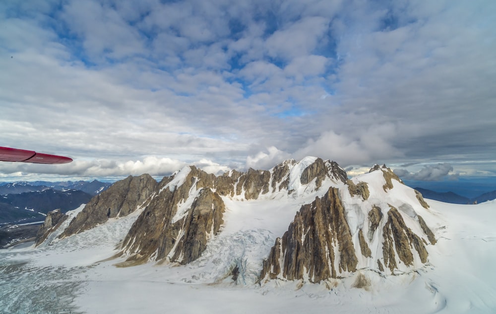 snow covered mountain under blue sky during daytime