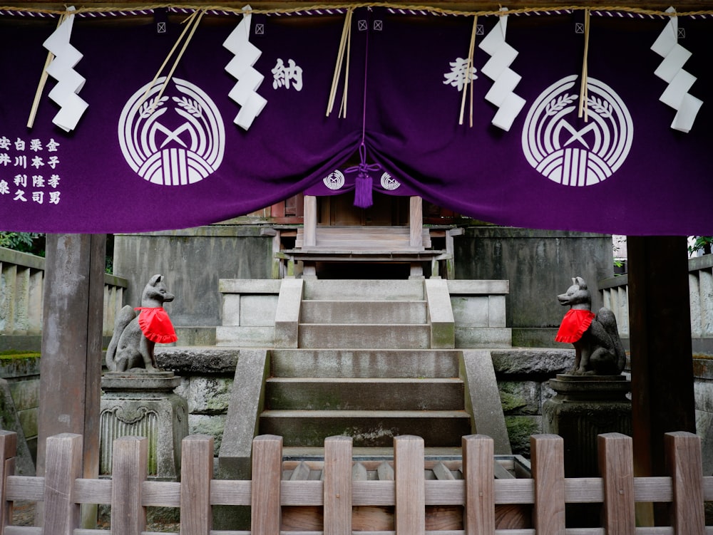 white and purple cross on gray concrete stairs