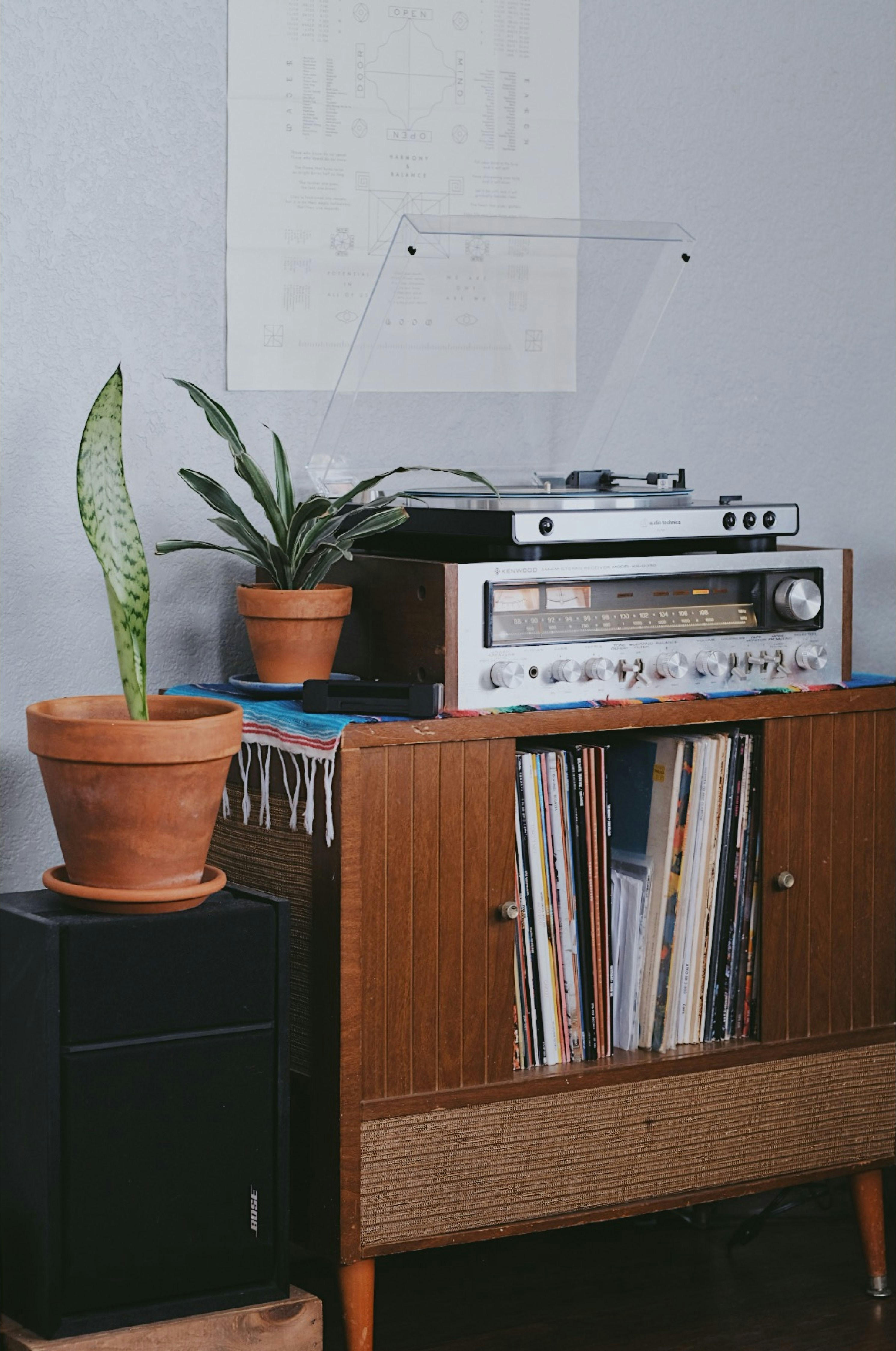 gray radio on brown wooden cabinet